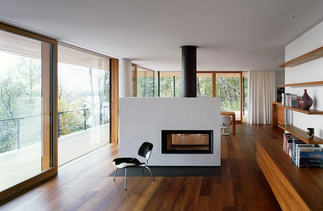 "Wohnhaus Heilbronn von K_m Architektur in Deutschland. Holz ist ein ganz besonderes Baumaterial. Holz ist traditionell und modern zugleich."